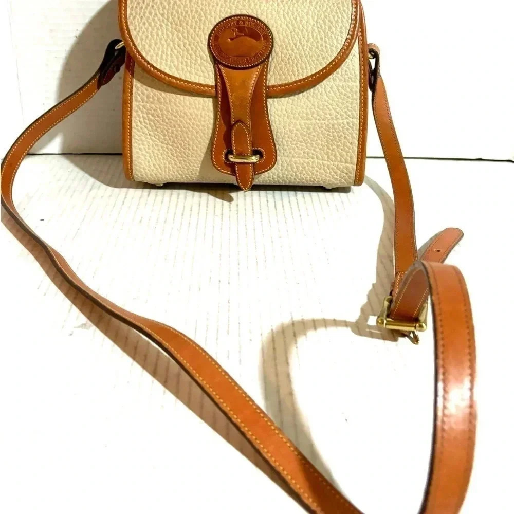 Dooney & bourke cream vintage leather crossbody handbag